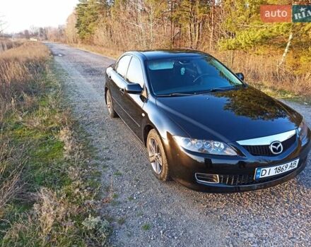 Черный Мазда 6, объемом двигателя 1.8 л и пробегом 200 тыс. км за 4700 $, фото 1 на Automoto.ua