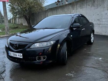 Черный Мазда 6, объемом двигателя 1.8 л и пробегом 301 тыс. км за 3800 $, фото 1 на Automoto.ua