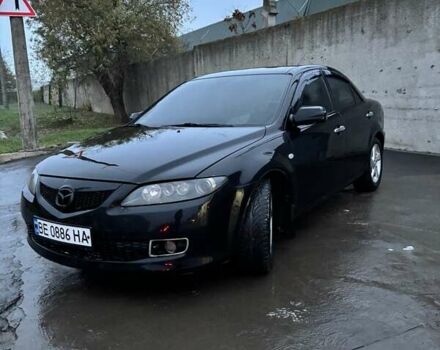 Черный Мазда 6, объемом двигателя 1.8 л и пробегом 301 тыс. км за 3800 $, фото 1 на Automoto.ua