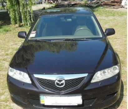 Чорний Мазда 6, об'ємом двигуна 2 л та пробігом 253 тис. км за 6500 $, фото 1 на Automoto.ua