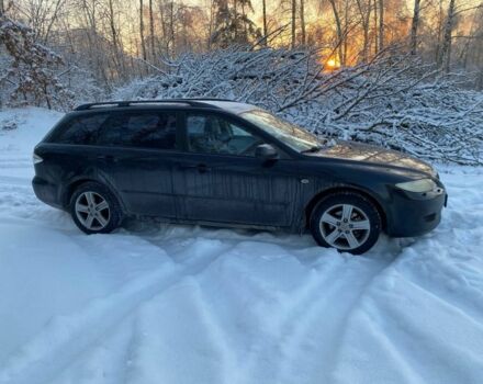 Черный Мазда 6, объемом двигателя 2 л и пробегом 236 тыс. км за 1700 $, фото 1 на Automoto.ua