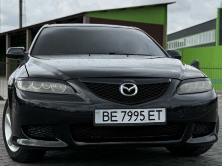 Черный Мазда 6, объемом двигателя 2 л и пробегом 320 тыс. км за 3400 $, фото 1 на Automoto.ua