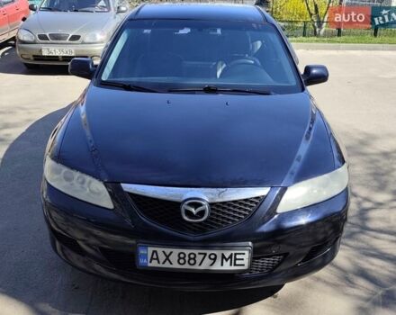 Черный Мазда 6, объемом двигателя 2 л и пробегом 215 тыс. км за 5500 $, фото 1 на Automoto.ua
