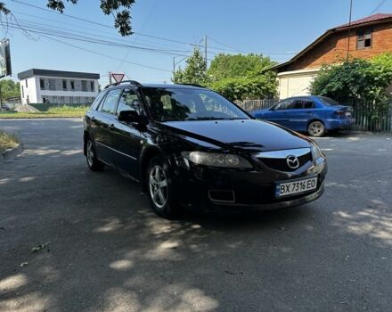 Черный Мазда 6, объемом двигателя 2 л и пробегом 300 тыс. км за 1700 $, фото 1 на Automoto.ua