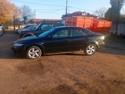 Черный Мазда 6, объемом двигателя 2 л и пробегом 170 тыс. км за 2500 $, фото 1 на Automoto.ua