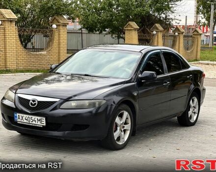 Черный Мазда 6, объемом двигателя 2.3 л и пробегом 250 тыс. км за 3300 $, фото 1 на Automoto.ua