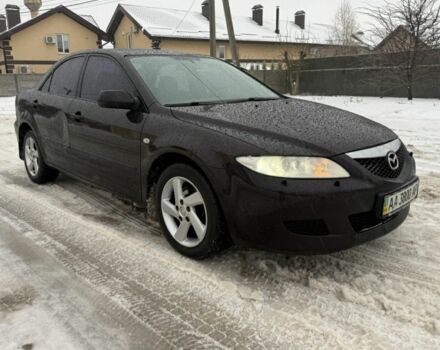 Черный Мазда 6, объемом двигателя 2 л и пробегом 248 тыс. км за 1850 $, фото 1 на Automoto.ua