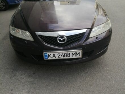 Черный Мазда 6, объемом двигателя 2 л и пробегом 275 тыс. км за 3003 $, фото 1 на Automoto.ua
