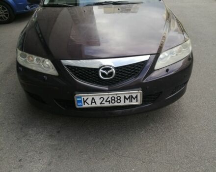 Черный Мазда 6, объемом двигателя 2 л и пробегом 275 тыс. км за 3003 $, фото 1 на Automoto.ua