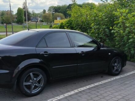 Черный Мазда 6, объемом двигателя 2 л и пробегом 329 тыс. км за 4300 $, фото 1 на Automoto.ua