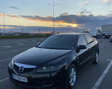 Черный Мазда 6, объемом двигателя 2 л и пробегом 285 тыс. км за 3900 $, фото 1 на Automoto.ua