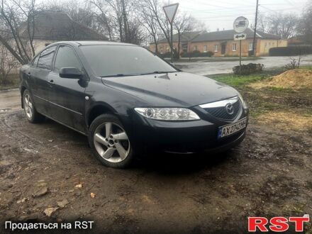 Черный Мазда 6, объемом двигателя 2 л и пробегом 300 тыс. км за 3000 $, фото 1 на Automoto.ua