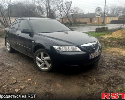 Черный Мазда 6, объемом двигателя 2 л и пробегом 300 тыс. км за 3000 $, фото 1 на Automoto.ua