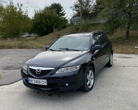 Черный Мазда 6, объемом двигателя 2 л и пробегом 280 тыс. км за 2350 $, фото 1 на Automoto.ua