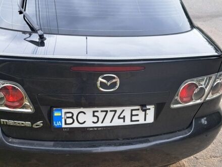 Черный Мазда 6, объемом двигателя 2 л и пробегом 370 тыс. км за 3000 $, фото 1 на Automoto.ua