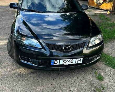 Черный Мазда 6, объемом двигателя 2 л и пробегом 284 тыс. км за 5400 $, фото 1 на Automoto.ua