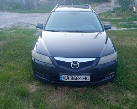 Черный Мазда 6, объемом двигателя 2 л и пробегом 340 тыс. км за 2900 $, фото 1 на Automoto.ua