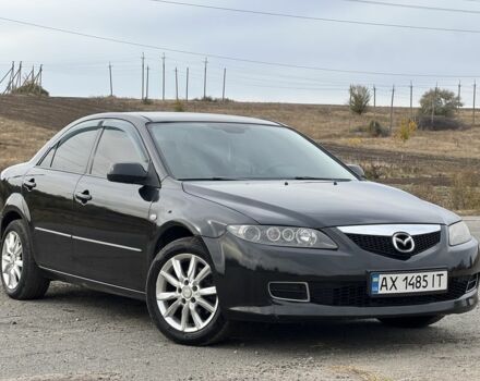 Черный Мазда 6, объемом двигателя 2 л и пробегом 266 тыс. км за 4950 $, фото 1 на Automoto.ua