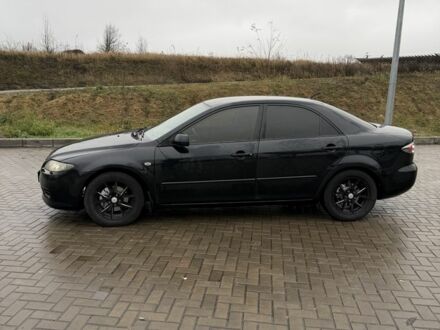 Чорний Мазда 6, об'ємом двигуна 2 л та пробігом 214 тис. км за 4300 $, фото 1 на Automoto.ua