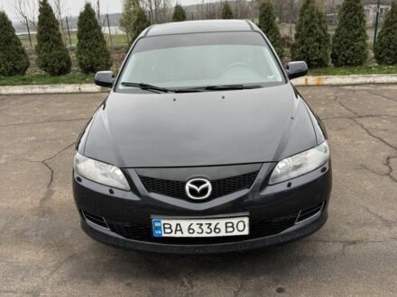 Черный Мазда 6, объемом двигателя 2 л и пробегом 286 тыс. км за 4800 $, фото 1 на Automoto.ua