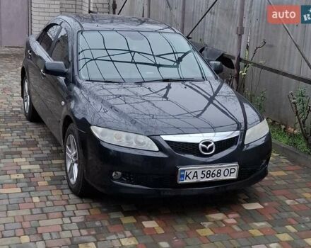Черный Мазда 6, объемом двигателя 2 л и пробегом 183 тыс. км за 4000 $, фото 1 на Automoto.ua