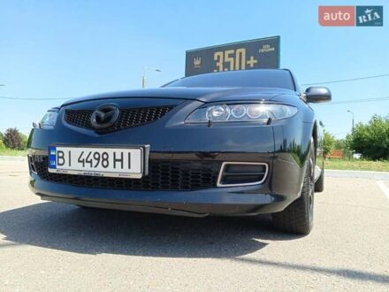 Черный Мазда 6, объемом двигателя 1.8 л и пробегом 204 тыс. км за 6000 $, фото 1 на Automoto.ua