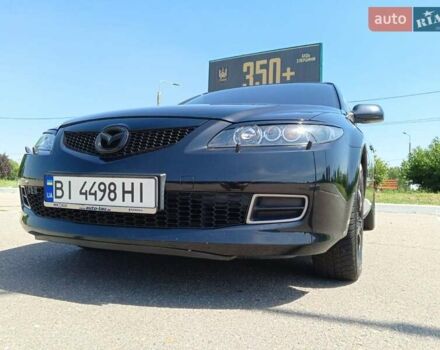 Черный Мазда 6, объемом двигателя 1.8 л и пробегом 204 тыс. км за 6000 $, фото 1 на Automoto.ua