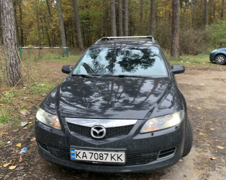 Черный Мазда 6, объемом двигателя 2.3 л и пробегом 303 тыс. км за 6000 $, фото 1 на Automoto.ua