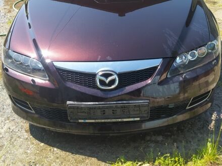 Черный Мазда 6, объемом двигателя 2 л и пробегом 197 тыс. км за 2400 $, фото 1 на Automoto.ua