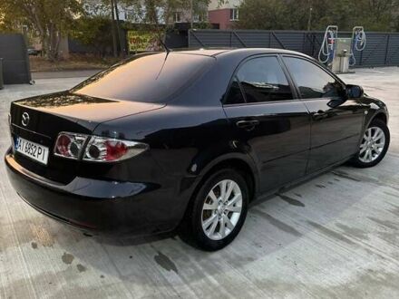 Черный Мазда 6, объемом двигателя 2 л и пробегом 250 тыс. км за 4800 $, фото 1 на Automoto.ua