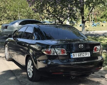 Чорний Мазда 6, об'ємом двигуна 2 л та пробігом 220 тис. км за 5495 $, фото 1 на Automoto.ua