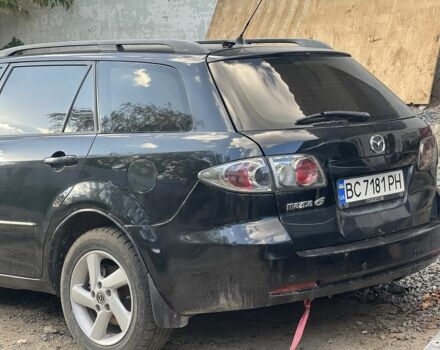 Черный Мазда 6, объемом двигателя 2 л и пробегом 250 тыс. км за 652 $, фото 1 на Automoto.ua