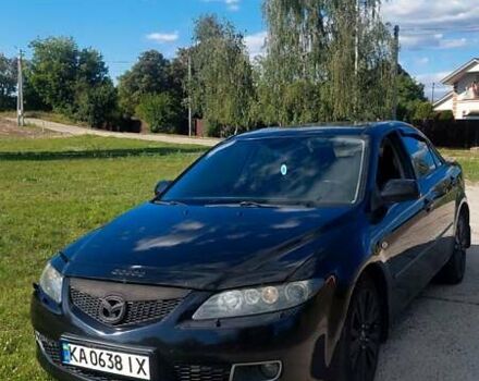 Черный Мазда 6, объемом двигателя 2 л и пробегом 244 тыс. км за 5800 $, фото 1 на Automoto.ua