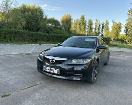 Черный Мазда 6, объемом двигателя 2 л и пробегом 299 тыс. км за 4500 $, фото 1 на Automoto.ua