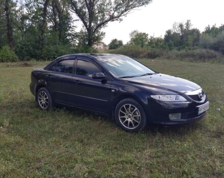 Черный Мазда 6, объемом двигателя 2 л и пробегом 140 тыс. км за 8500 $, фото 1 на Automoto.ua