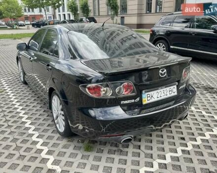 Черный Мазда 6, объемом двигателя 2.3 л и пробегом 280 тыс. км за 4200 $, фото 1 на Automoto.ua