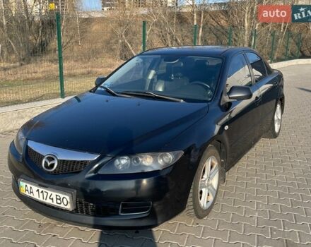 Черный Мазда 6, объемом двигателя 2 л и пробегом 318 тыс. км за 3000 $, фото 1 на Automoto.ua