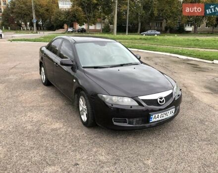 Черный Мазда 6, объемом двигателя 2 л и пробегом 146 тыс. км за 4200 $, фото 1 на Automoto.ua