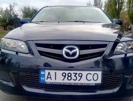Черный Мазда 6, объемом двигателя 2.3 л и пробегом 412 тыс. км за 3300 $, фото 1 на Automoto.ua