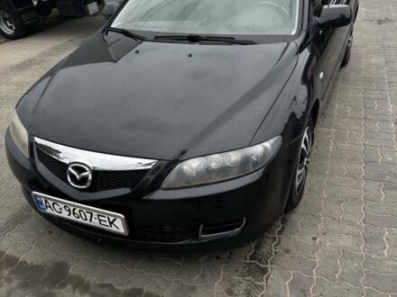 Черный Мазда 6, объемом двигателя 2 л и пробегом 240 тыс. км за 4900 $, фото 1 на Automoto.ua
