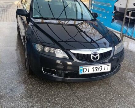 Черный Мазда 6, объемом двигателя 2 л и пробегом 238 тыс. км за 6200 $, фото 1 на Automoto.ua