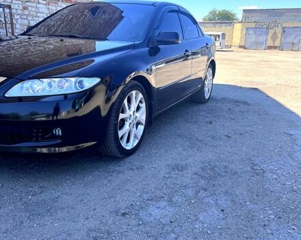 Черный Мазда 6, объемом двигателя 2 л и пробегом 260 тыс. км за 5500 $, фото 1 на Automoto.ua
