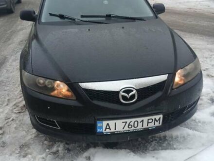 Черный Мазда 6, объемом двигателя 1.8 л и пробегом 374 тыс. км за 3600 $, фото 1 на Automoto.ua