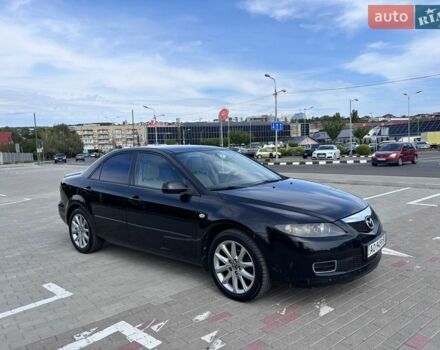 Черный Мазда 6, объемом двигателя 2 л и пробегом 240 тыс. км за 4200 $, фото 1 на Automoto.ua