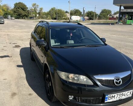 Черный Мазда 6, объемом двигателя 2 л и пробегом 225 тыс. км за 7000 $, фото 1 на Automoto.ua