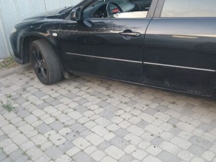 Черный Мазда 6, объемом двигателя 2.3 л и пробегом 200 тыс. км за 6500 $, фото 1 на Automoto.ua