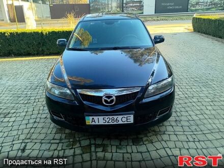 Чорний Мазда 6, об'ємом двигуна 2 л та пробігом 215 тис. км за 4900 $, фото 1 на Automoto.ua