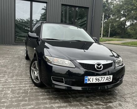 Черный Мазда 6, объемом двигателя 2 л и пробегом 240 тыс. км за 4000 $, фото 1 на Automoto.ua