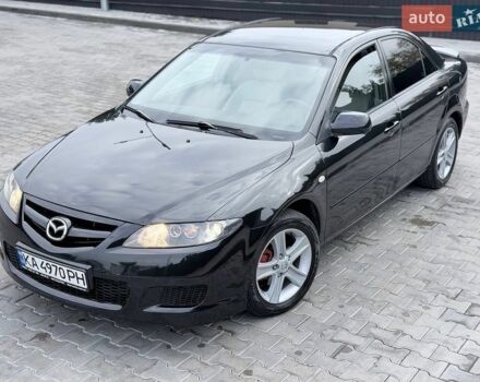 Черный Мазда 6, объемом двигателя 2 л и пробегом 187 тыс. км за 5700 $, фото 1 на Automoto.ua