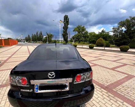 Черный Мазда 6, объемом двигателя 2 л и пробегом 235 тыс. км за 5500 $, фото 1 на Automoto.ua